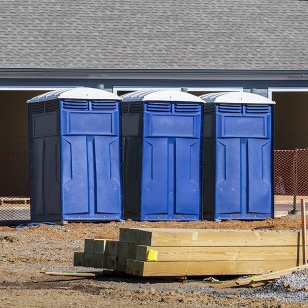 what is the cost difference between standard and deluxe portable restroom rentals in Gibson Tennessee